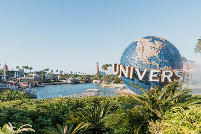 Universal Studios globe with palm trees