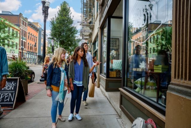 Shopping on Vine Street Over the Rhine posed